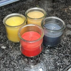 Set of Four Scented Candles - Red, Yellow, Gray, Cream